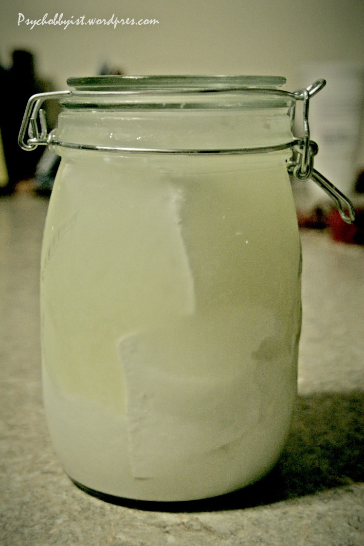 Feta cheese aging in a jar